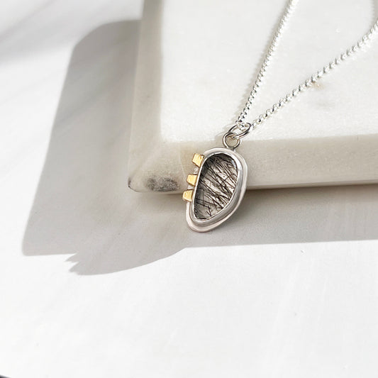 Black tourmalinated quartz necklace with 18k gold accent
