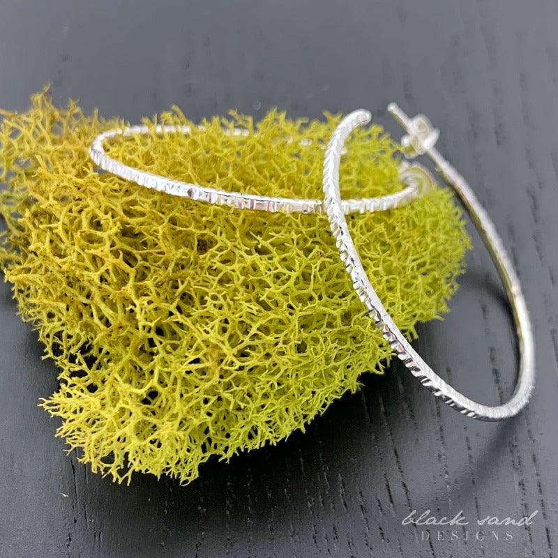Large silver hoop post earrings