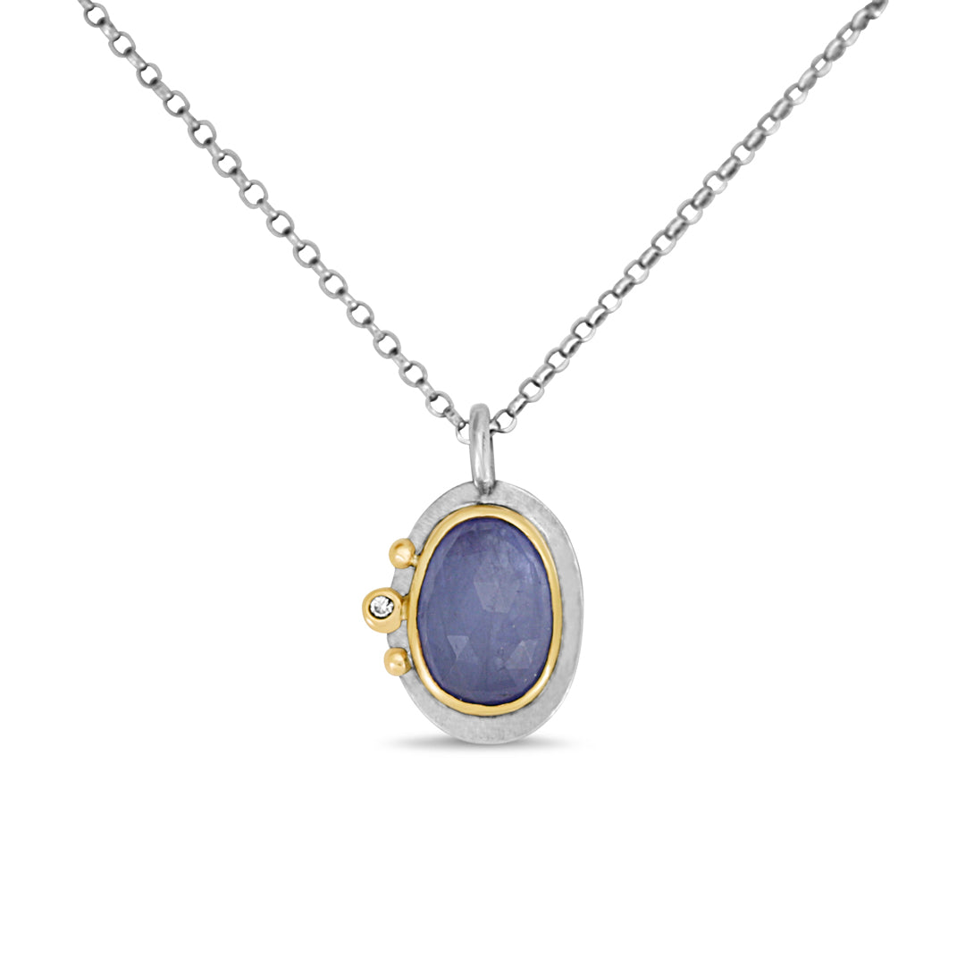 Handcrafted Tanzanite gold and diamond pendant