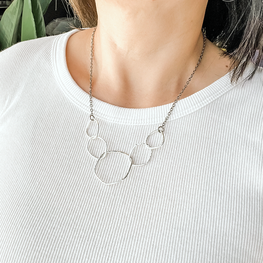 Handmade organic shaped necklace in sterling silver