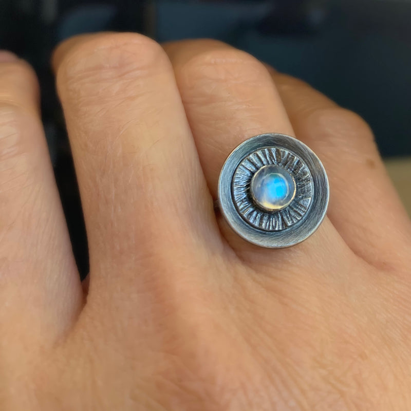 Circle Starburst Rainbow Moonstone Ring on Hand