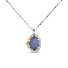 Handcrafted Tanzanite gold and diamond pendant